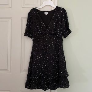 Black ruffle dress with white star print